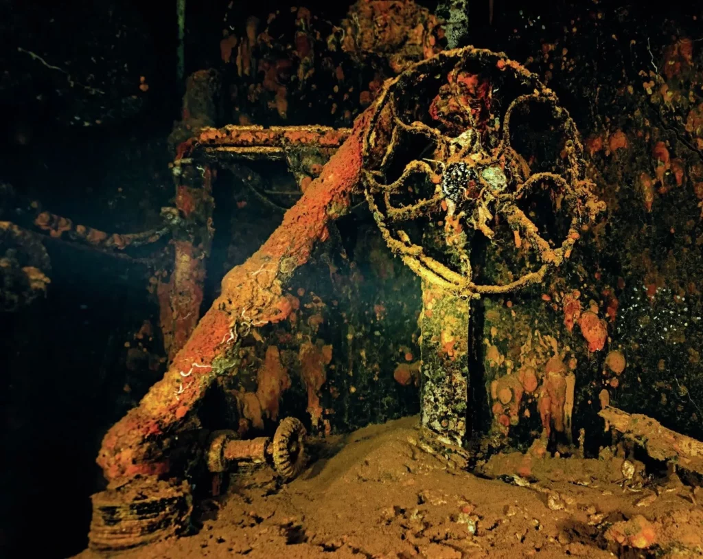 A fan on the wall in the machine shop of the USS Saratoga in Bikini Atoll