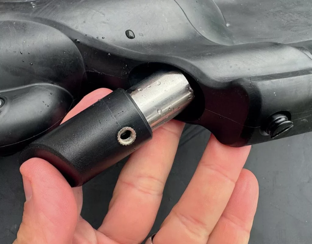 Weight slugs are swapped into the side of a Halcyon Vector Pro fin.