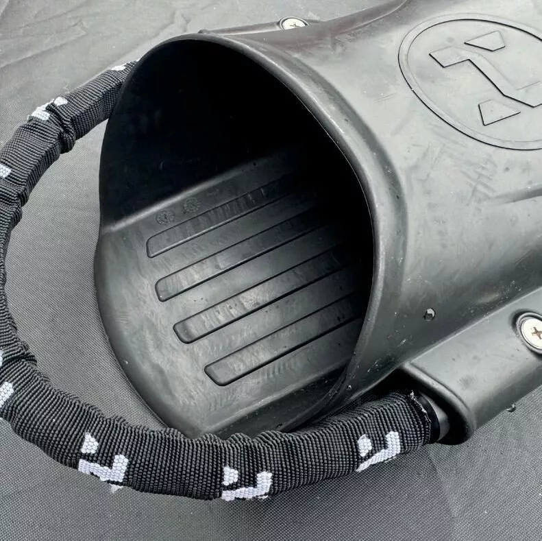 The adjustable covered spring strap and large foot pocket of a Halcyon Vector Pro fin.