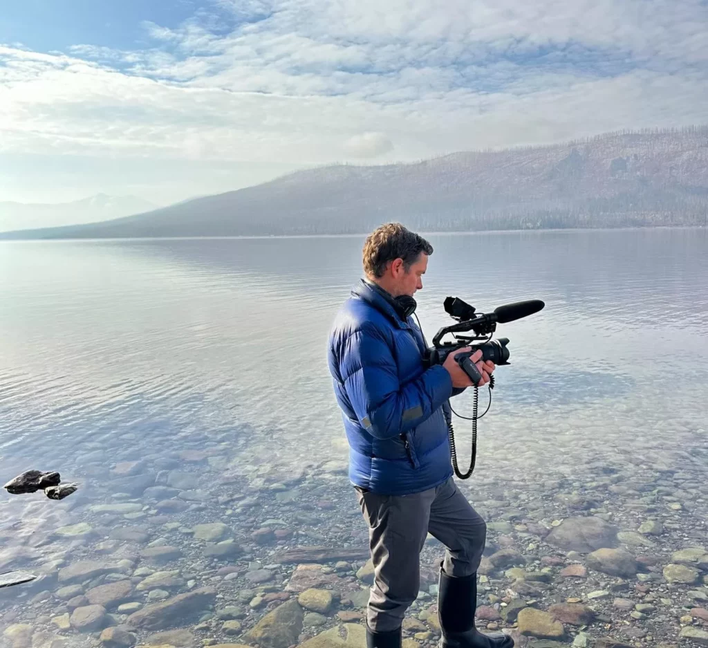 Producer-director Damon Ristau at Lake McDonald (FilmWest)