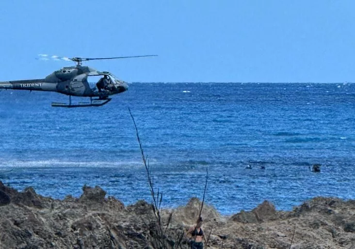 Dive-centre fined $10,000 for helicopter drops 2 The Trident-branded helicopter (DLNR)