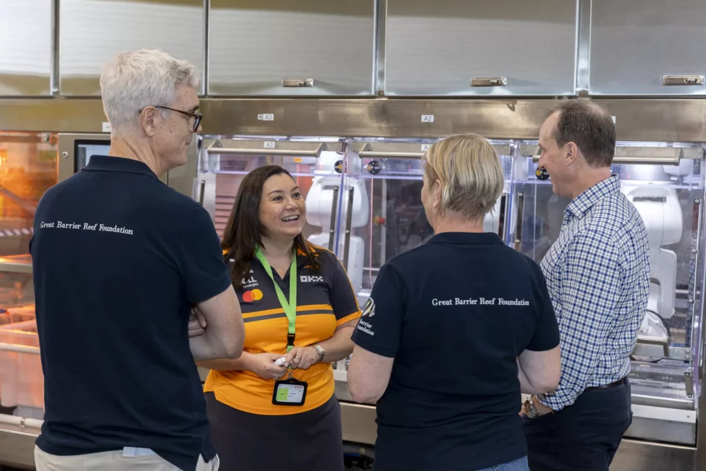 McLaren Racing sustainability director Kim Wilson talks to GBRF staff (McLaren Racing)