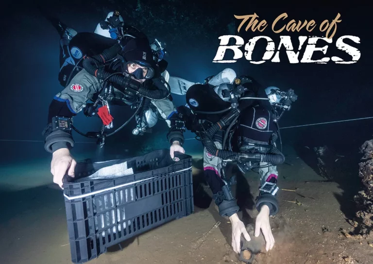A technical cave diver carefully recovering 11,000-year-old human remains from the floor of the Cave of Bones in Mato Grosso, Brazil.