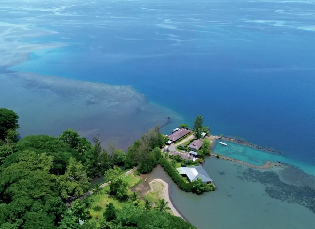 The wonders of Walindi: A Guide to Kimbe Bay, Papua New Guinea 10 Drone photography showing the lush tropical gardens and coastal bungalows of Walindi Plantation Resort on New Britain Island.