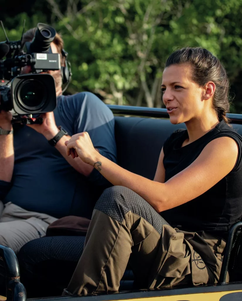 TV presenter Lizzie Daly on location in the Amazon rainforest, documenting wildlife in high-humidity tropical environments.