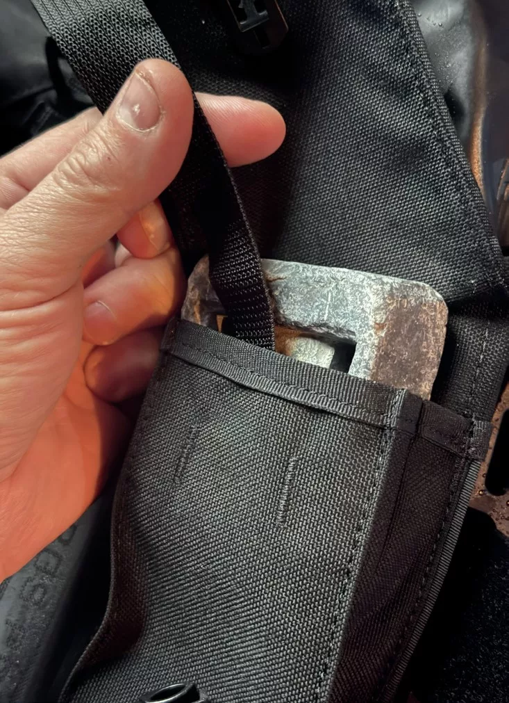 Detailed view of the integrated weight pocket and Monorail system on the Scubapro Hydros Pro 2.