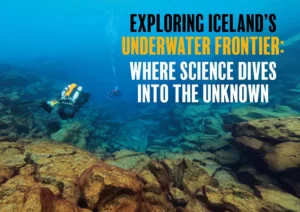 A wide-angle view of the crystal-clear blue waters of the Silfra Rift, illustrating Iceland's underwater frontier.