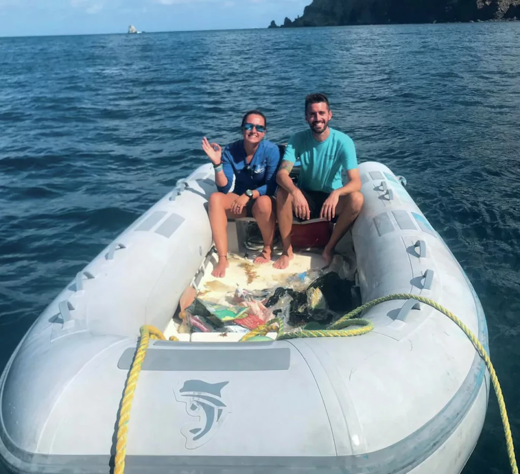 Q&A with Liveaboard Pioneer Clay McCardell 13 Clay McCardell and his team smiling after a successful marine debris cleanup.