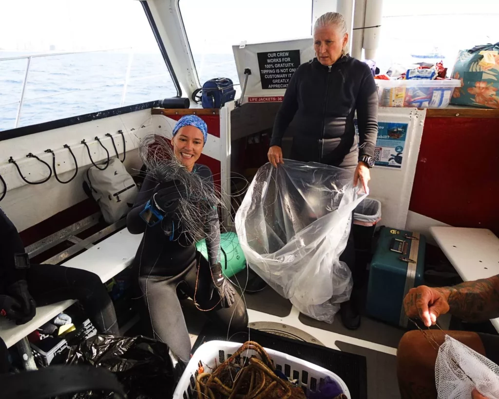 Boat co-ordinator Marika Webber with discarded metal leader 