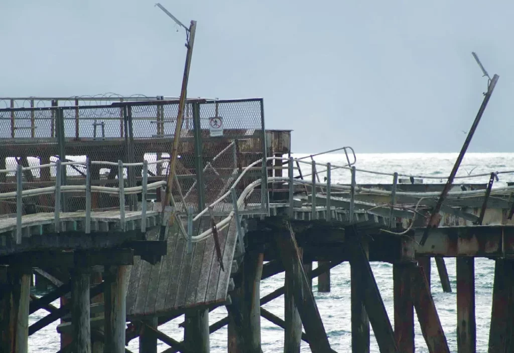 Topside view of the damaged and derelict historic old Rapid Bay pier after being hit by a major storm.