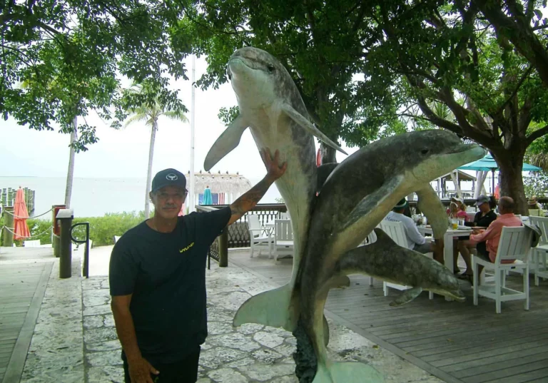 Wyland with one of his sculptures in Islamorada (JC Fine)