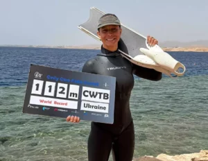 Ukrainian athlete Nataliia Zharkova marks the first of two world records