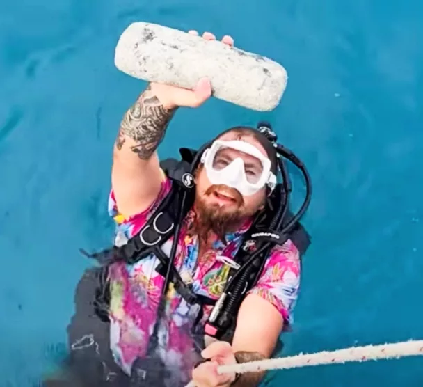Diver Drake Nicholas with an unexpected Atocha find (Mel Fisher's Shipwreck Expeditions)