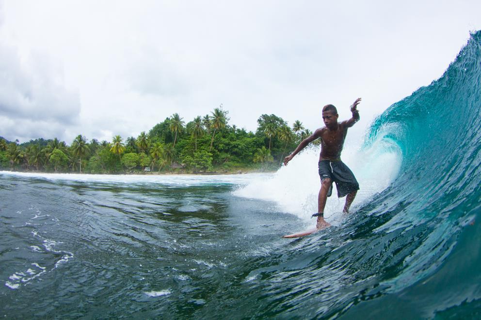 Surfing off Vanimo Surf Lodge