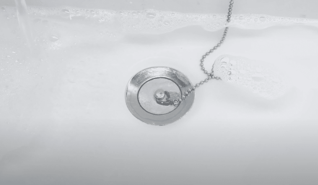 Basin with warm soapy water