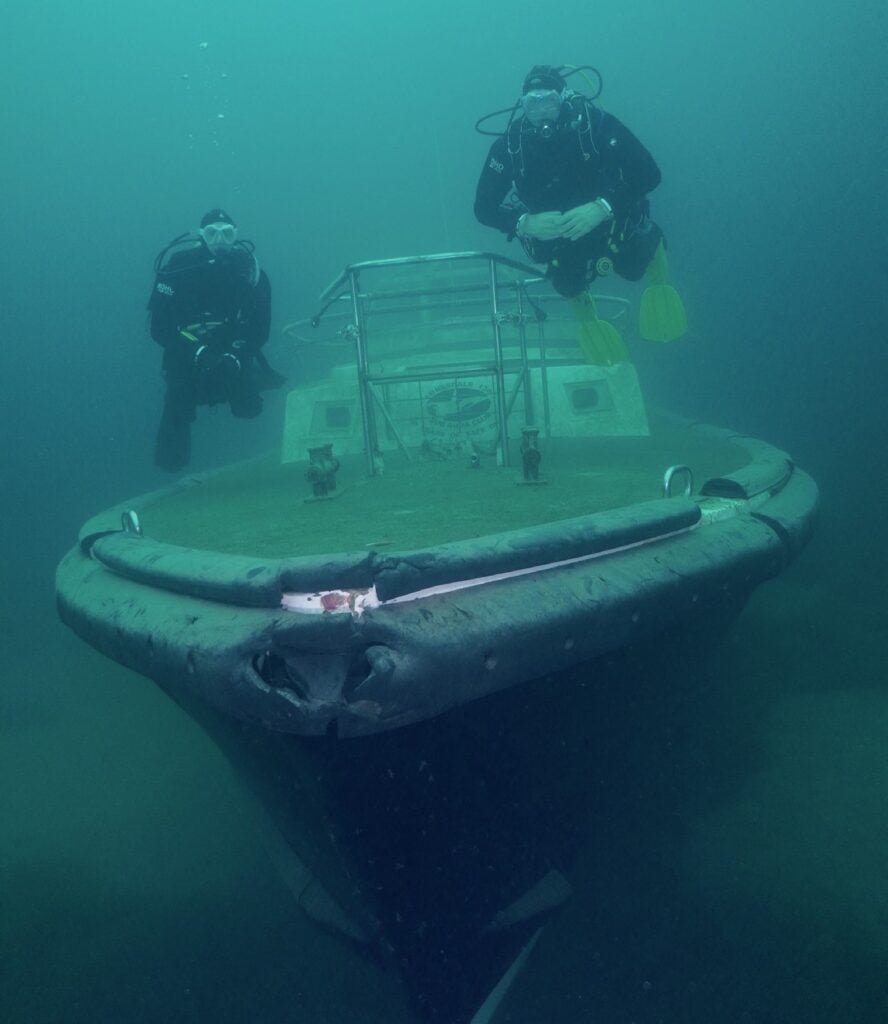 Harry and Adrian Promfet at the bow of the Ted Tandy