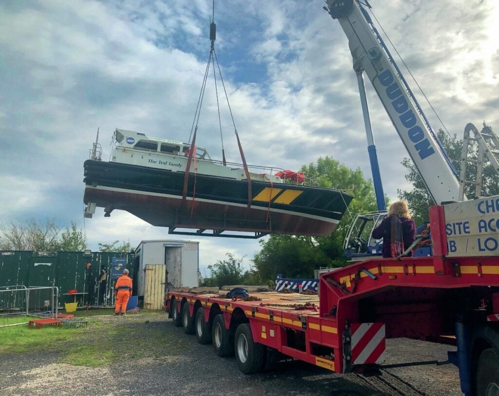 The Ted Tandy is lifted out of the car park