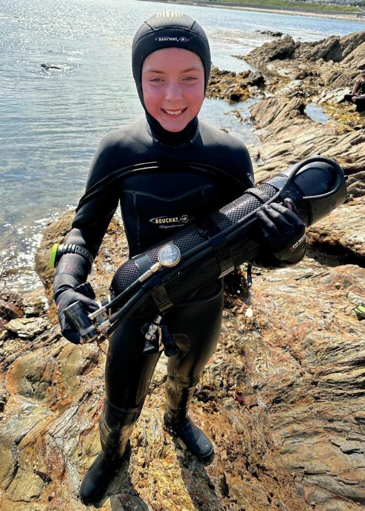 Isla is all smiles after a dive