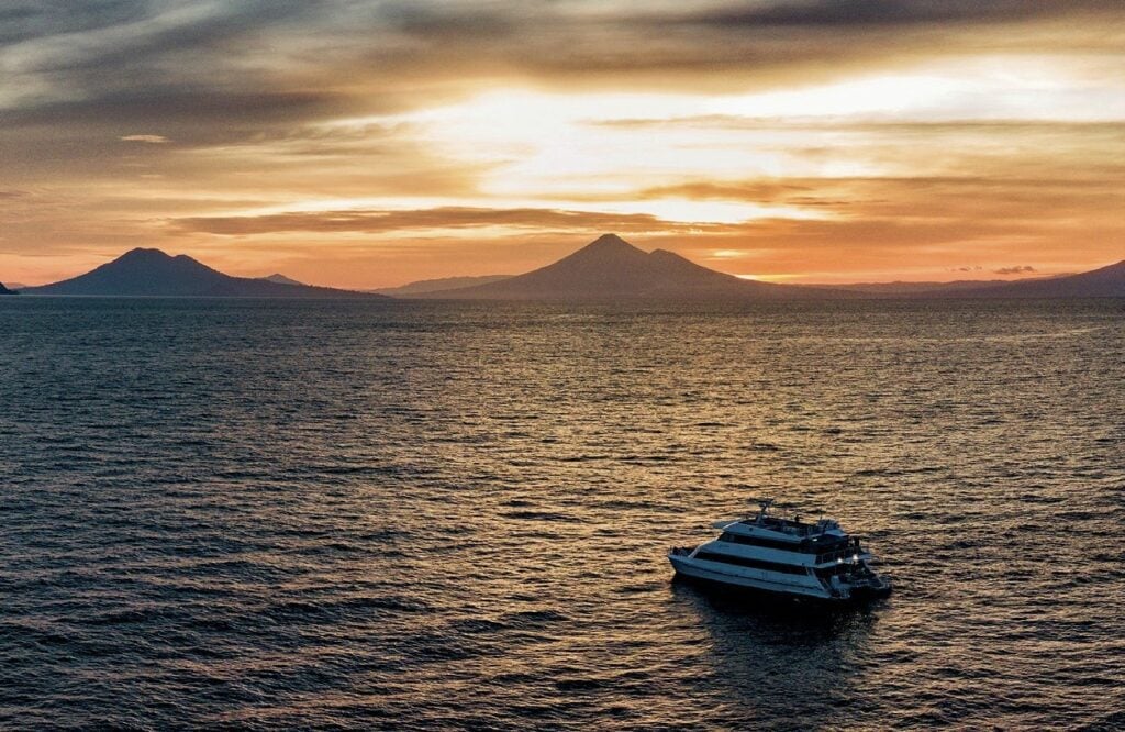 Diving New Britain's Fathers Reefs 5 Sunset over a liveaboard
